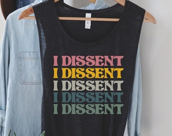 May include: A black sleeveless tank top with the phrase "I Dissent" repeated five times in rainbow colors. The text is in a retro font style.