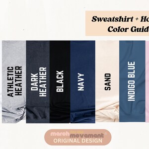 a white sheet with black, pink, blue, and white text on it
