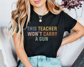 This Teacher Won't Carry a Gun | Gun Reform Now | Cozy Sweatshirt | Teacher Shirt | Protect Kids Not Guns | Anti-Assault Weapon Shirt