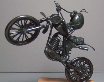 Dirt motorcycle, wheelie