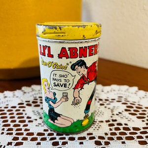 Vintage 1953 Li’l Abner’s “Can of Coins” Bank”