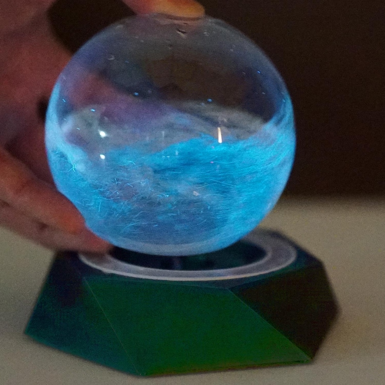 Blue/Green Thr3d Labs 3-D Printed Fluorescent Bio-base with timer grow-light attached. Bio-Orb is included & bioluminescent.