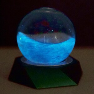 Blue/Green Thr3d Labs 3-D Printed Fluorescent Bio-base with timer grow-light attached. Bio-Orb is included & bioluminescent.