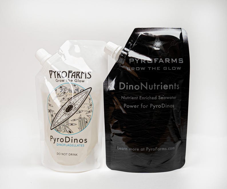 Pyrofarms White Dinoflagellate pouch & Black nutrient pouches against a white background.