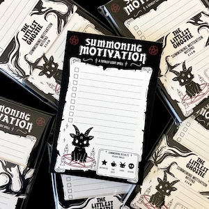 May include: A black and white notepad titled Summoning Motivation A Totally Legit Spell. The page features a checklist, a graphic of a horned creature sitting on a pentagram with candles, and a Summoning Results section with icons to circle.