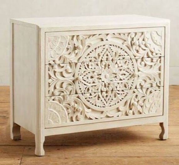 Carved wood dresser deals