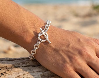 Sterlingzilveren kabelkettingarmband met gekruiste tuimelsluiting, zware uniseks armband