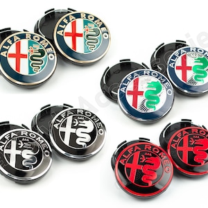 May include: Set of ten black and silver car hubcaps with the Alfa Romeo logo and a snake design. The hubcaps are arranged in a circle on a white background.