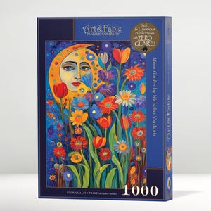 May include: A 1000-piece jigsaw puzzle featuring a vibrant illustration of a moon face surrounded by colorful flowers. The puzzle box is dark blue with text that reads "Art & Fable Puzzle Company" and "Moon Garden by Nicholas Vardaxis."