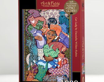May include: A 1000-piece jigsaw puzzle titled "Cat Lady" by Daniella Willett-Rabin. The puzzle features a colorful illustration of a woman surrounded by numerous patterned cats in various colors. The box reads "Soft & Luxurious Puzzle Pieces with ZERO GLARE!"