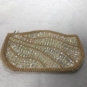 Clutch bag, coin purse, vintage makeup bag garnished with white sequins and ivory pearls