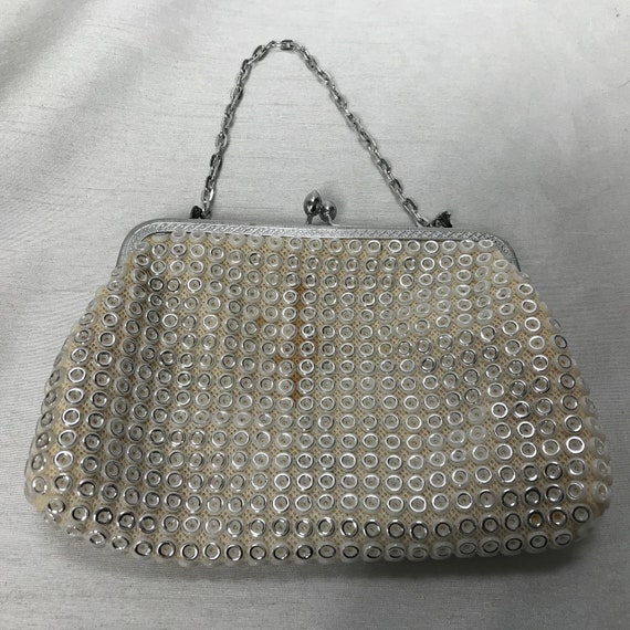 White and silver vintage handbag