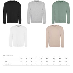 May include: Five crew neck sweatshirts in black, gray, white, sage green, and beige. The image includes a size conversion chart with chest measurements ranging from 34 to 62 inches. These sweatshirts are a versatile addition to any wardrobe.