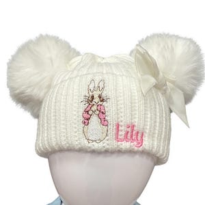 Personalised Peter Rabbit Hat With Double Pom Pom, Babies Embroidered Name Hat, Knitted Hat Baby&#39;s Name, Pom Pom Velvet Bow, 0 - 12 Months