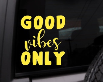 May include: Yellow vinyl decal with the text "GOOD vibes ONLY" on a black background.