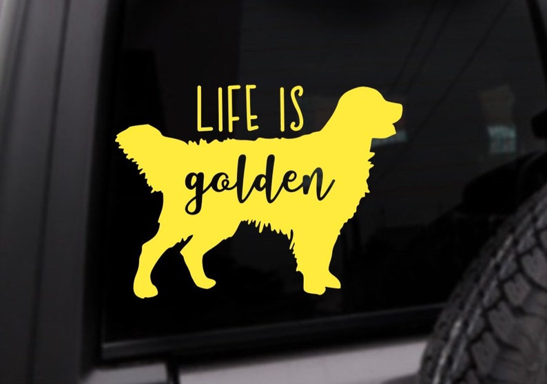 May include: Yellow vinyl decal of a golden retriever with the text "Life is golden" on a black background.