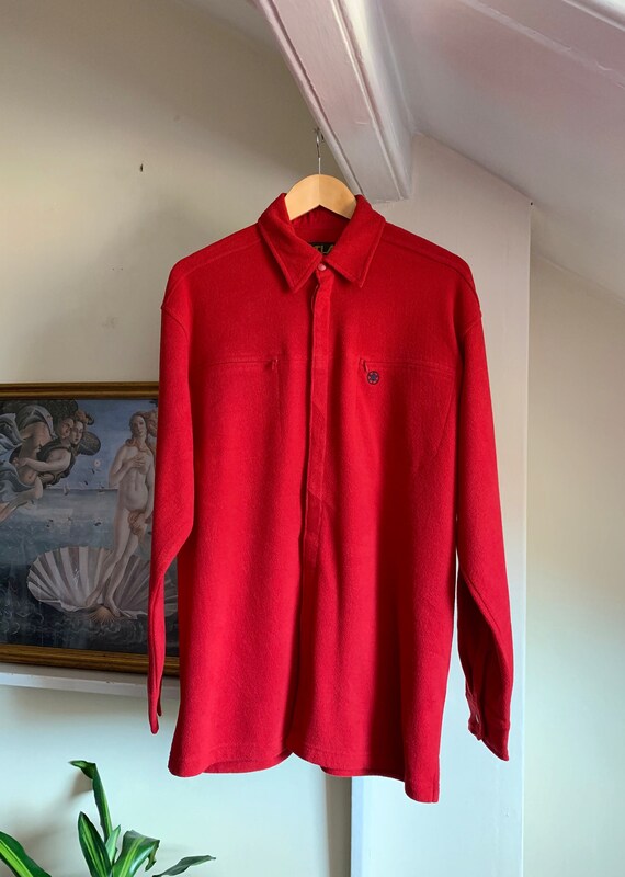 red baggy shirt