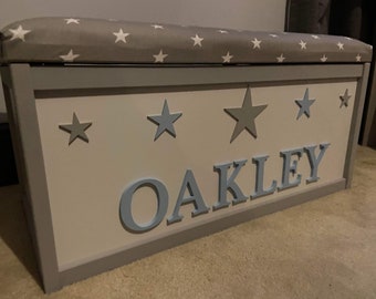 Personalised toy box with lift off lid, can be used as a seat, lovely gift or nursery furniture/blanket box. Add your child's name.