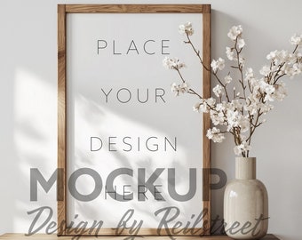 Vertical Wooden Frame On Dresser Decorative Flowers Mockup PSD in Warm Home Interior