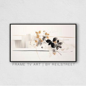May include: Abstract art print with gold and black leaves on a white background. The print has a minimalist style and features a few thin lines. The text "FRAME TV ART | BY REILSTREET" is at the bottom of the print.