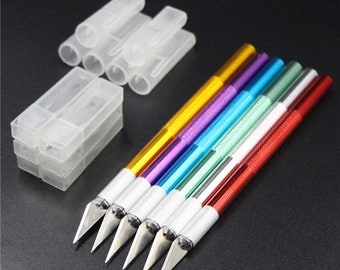 Scalpel with 5 extra blades