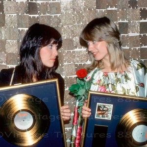Heart receives their Gold albums for Little Queen