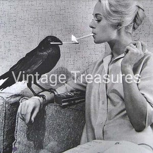 Tippi Hedren Having Her Cigarette Lit By a Crow
