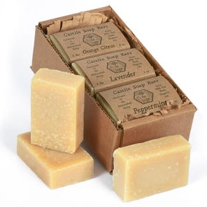 May include: A box of four bars of handmade castile soap in the scents Orange Citrus, Lavender, and Peppermint. The soap is made with 100% fair trade organic oils from the Shenandoah Valley.
