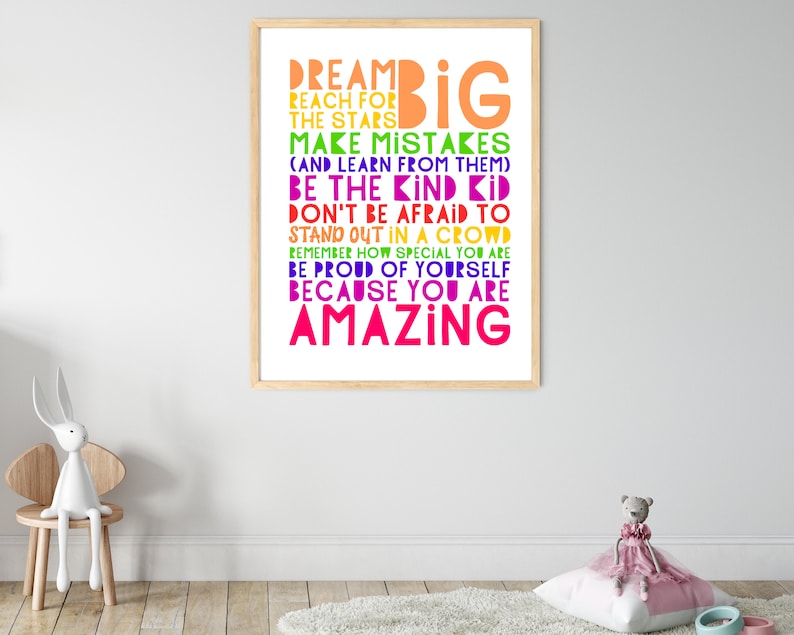 May include: A motivational poster with a rainbow color scheme and the text "Dream Big, Reach for the Stars, Make Mistakes (and learn from them), Be the Kind Kid, Don't be Afraid to Stand Out in a Crowd, Remember How Special You Are, Be Proud of Yourself Because You Are Amazing."