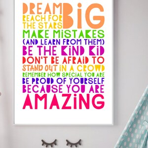 May include: A colorful motivational poster with the text "Dream Big" and a list of positive affirmations, including "Reach for the stars", "Make mistakes (and learn from them)", "Be the kind kid", "Don't be afraid to stand out in a crowd", "Remember how special you are", "Be proud of yourself", and "Because you are amazing".