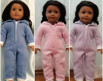 Hoodie style one-piece pajamas come in blue, pink and purple to fit American Girl and other 18 inch dolls.