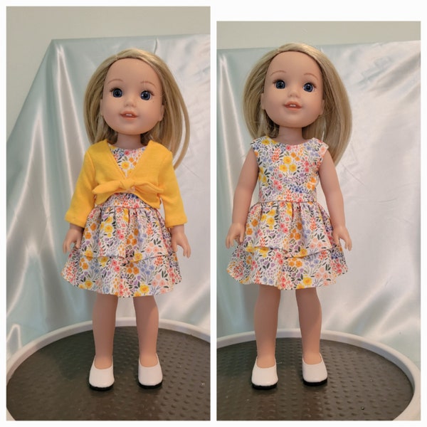 Sleeveless dress in summer flower print comes with bright yellow cardigan and fits Wellie Wishers, Glitter Girls, & other 14-15" dolls.