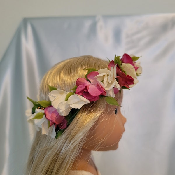 Flower crown has white and pink flowers and fits Wellie Wishers, Glitter Girls and other 14-15 inch dolls.