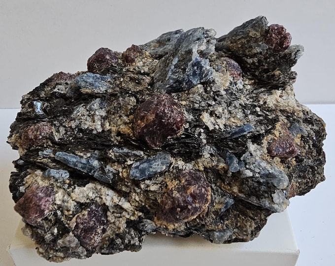 Ruby and Kainite on Mica from Kola Peninsula, Russia.