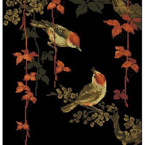 May include: Two birds perched on branches of a tree with red and green leaves against a black background. The birds are brown and yellow with red accents.