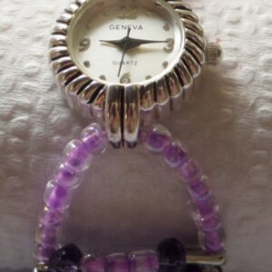purple safety pin watch