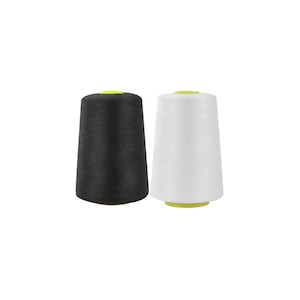 May include: Two spools of thread, one black and one white. The spools are cone-shaped and have a yellow plastic top.