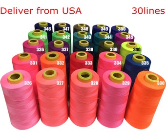 May include: Thirty spools of thread in various colors, including pink, orange, green, blue, and purple. The spools are arranged in a semi-circle, with the numbers 326 through 350 printed on each spool.