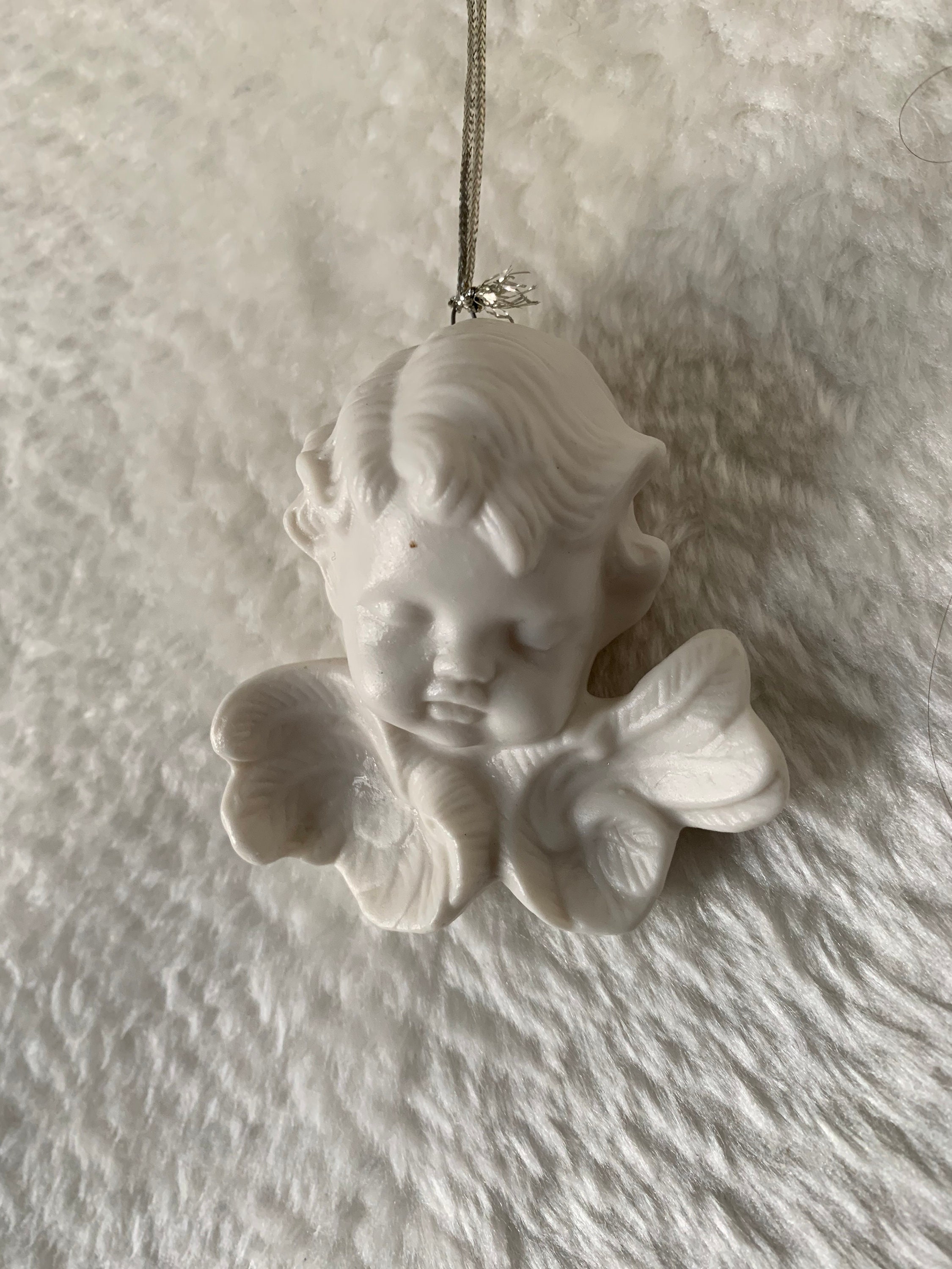 Ravissant Angelot Blanc