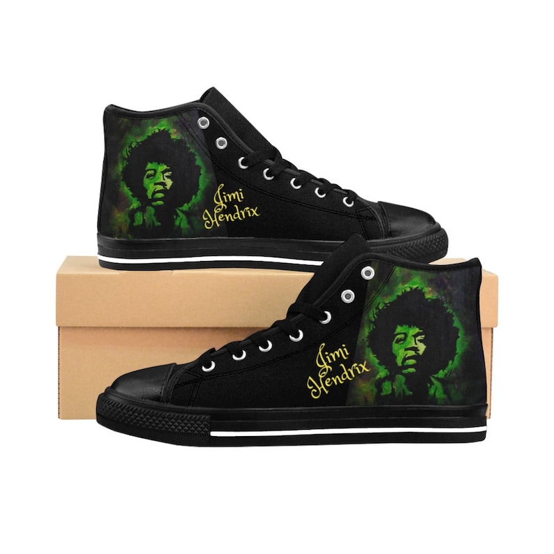May include: Black high-top canvas shoes with a green and black watercolor design featuring Jimi Hendrix. The shoes have white laces and a white stripe around the sole. The text "Jimi Hendrix" is written in gold on the side of the shoes.
