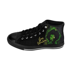 May include: Black high-top canvas shoes with a green and black image of Jimi Hendrix and the text "Jimi Hendrix" in gold lettering.