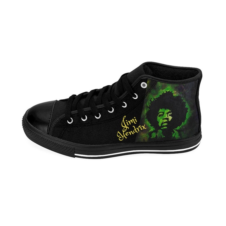 May include: Black high-top canvas shoes with a green and black image of Jimi Hendrix and the text "Jimi Hendrix" in gold lettering.