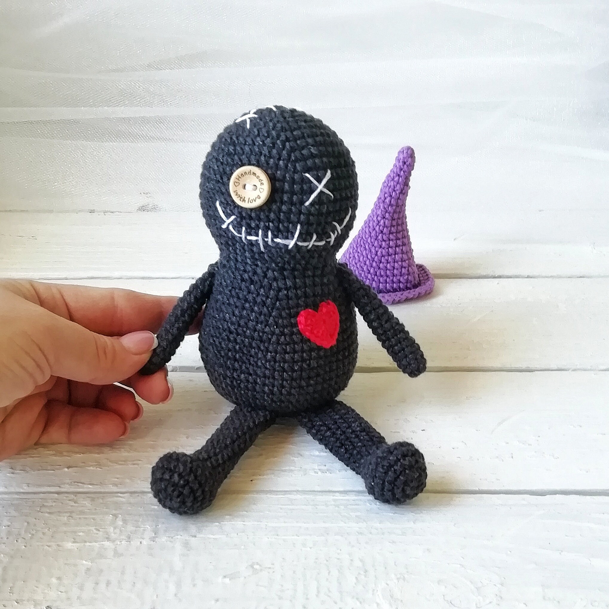 witch with voodoo doll