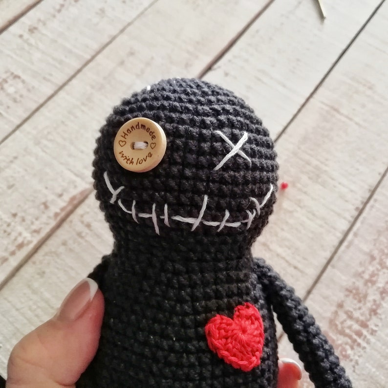 witch with voodoo doll