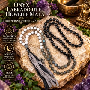 May include: A 108-bead hand-knotted mala necklace featuring white howlite, grey labradorite, and black onyx beads. The necklace includes a long, layered grey and black fabric tassel. Text on the image reads Onyx Labradorite Howlite Mala, 108 Bead Hand Knotted Mala, Protection, Intuition, and Peace.