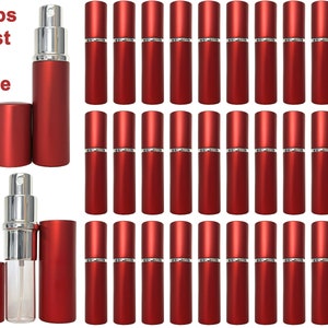 May include: Red refillable perfume atomizers with silver spray nozzles and matching caps. The image shows multiple atomizers, some with caps on and off, and the text "Ships Fast & Free". These travel-sized bottles are ideal for carrying fragrances.