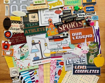 May include: A collection of colorful paper cutouts and stickers with various themes. Includes sports, school, and motivational phrases like "believe," "champion," and "level completed." There are also stars, a unicorn, and a school bus.