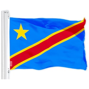 May include: A blue flag with a yellow star and a diagonal red stripe with a yellow border. The flag is waving in the wind.