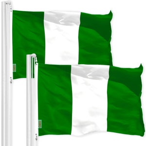 May include: Two green, white, and green flags of Nigeria waving on flagpoles.