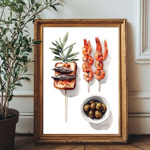 Könnte beinhalten: Aquarelldruck mit Vorspeisen, darunter Garnelenspieße, Oliven in einer kleinen Schüssel und ein Toastspieß mit Fisch und Grünzeug. Das Kunstwerk ist in einem goldfarbenen Rahmen vor weißem Hintergrund gerahmt.